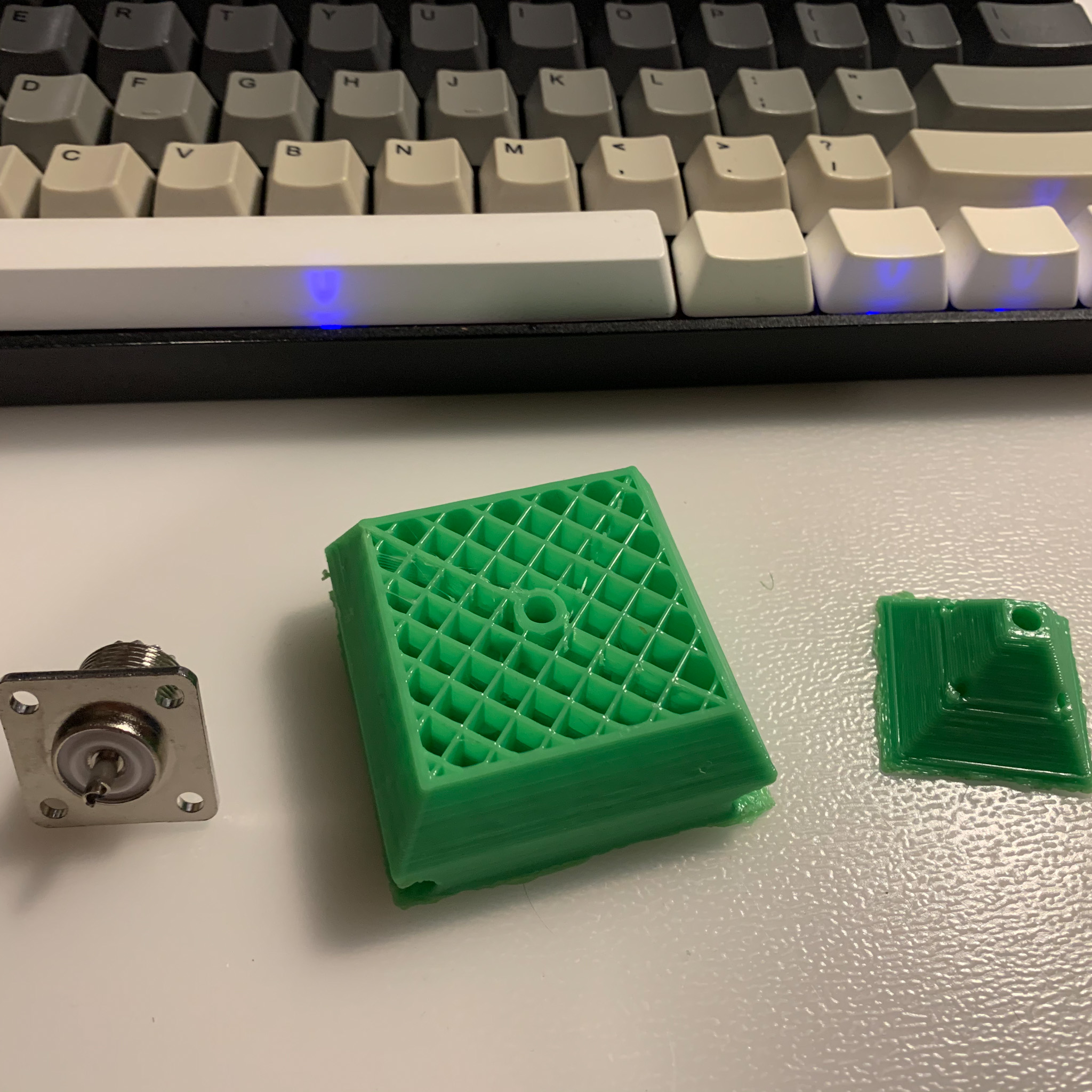A connector, the new print and the original print