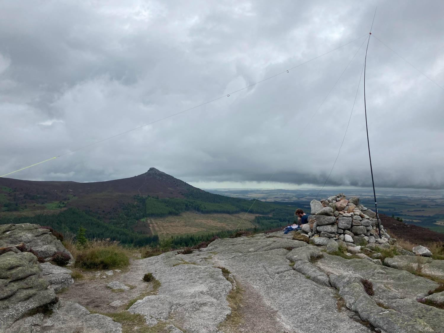 Me, sat behind a cairn, at the base of a mast operating a radio